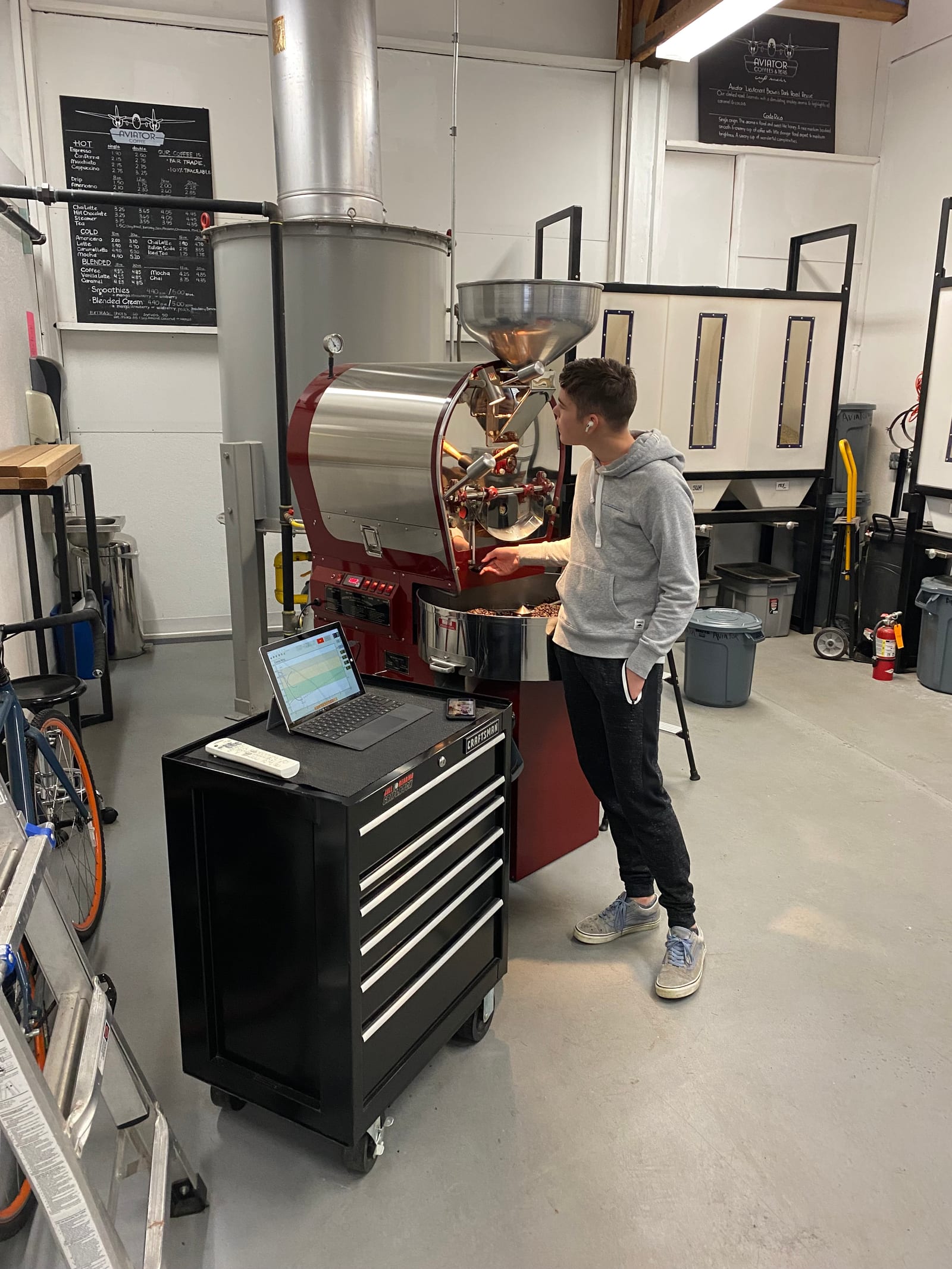 Cole Beckman roasting coffee at Aviator's Diedrich roaster