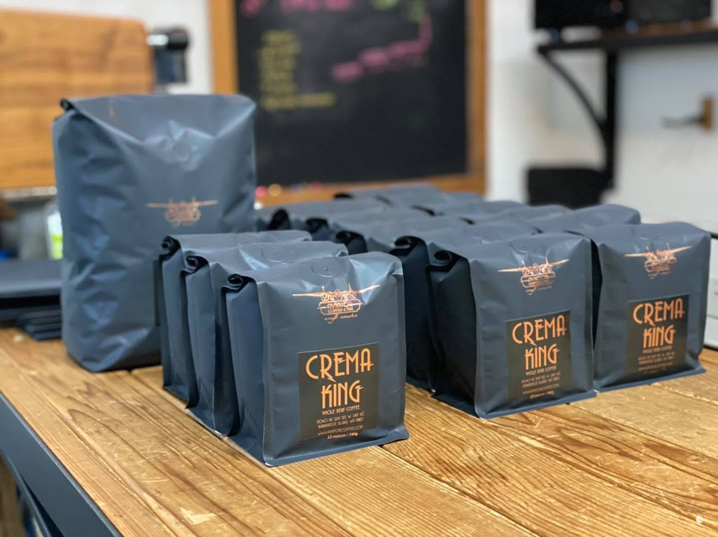 Crema King coffee bags lined up after roasting